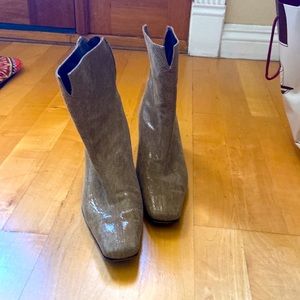 The perfect booties.  Leather. Could get dressed up or dressed down with jeans!